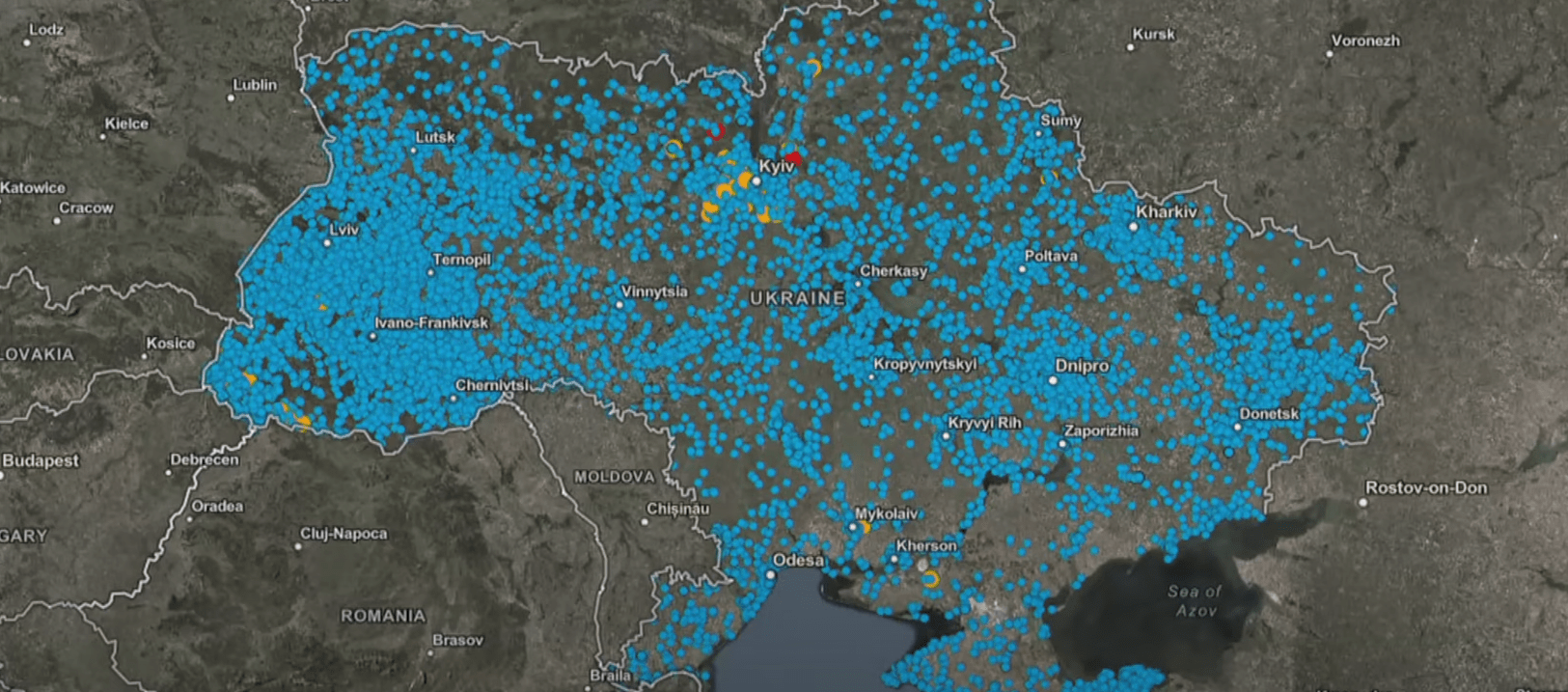 Map of Ukraine with blue and yellow dots indicating cultural heritage sites at risk